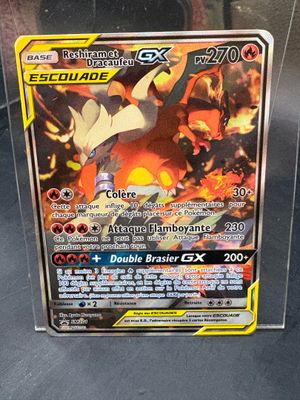 a close up of a pokemon card in a plastic case