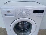 an image of a washing machine in a room