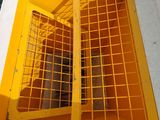 a cat that is inside of a cage in a box
