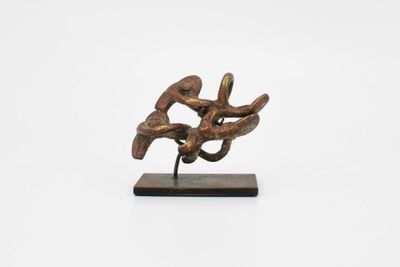 Pendentif représentant deux oiseaux l'un sur l'autre