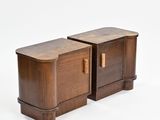 pair of mid - century walnut nightstands with brass pulls