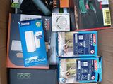 a cardboard box filled with electronics and other items