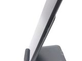 a close up of a cell phone on a stand