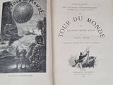 an open book with a picture of a boat in the water