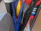 a woman that is standing next to a luggage bag