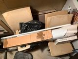 a pile of cardboard and cardboard boxes in a room