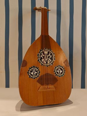 a wooden instrument that is sitting on a table