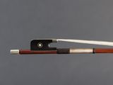 a close up of a violin bow with a wooden handle