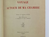 an open book with a picture of a woman in a red dress