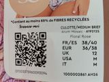 a card with a picture of a woman in a bikini