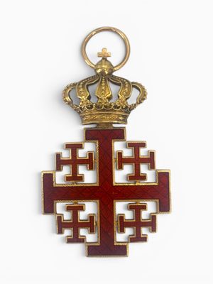 an image of a red and gold cross with a crown on top
