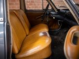 a brown leather seat in the back of a car