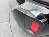 a close up of the rear end of a black car