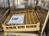a dishwasher that has a bunch of dirty dishes in it