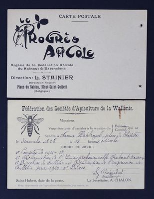 une vieille carte postale sur laquelle figurent l'image d'une abeille et une abeille