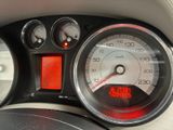 a close up of a speedometer in a car
