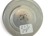 a glass plate with a sticker on it