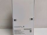 the back of a white box on a table with a white background