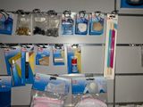 many items that are hanging on the wall in the store