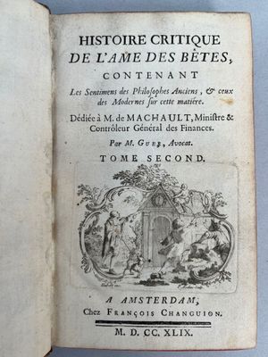 un livre ouvert sur lequel figure l'image d'un homme et d'une femme dans un jardin