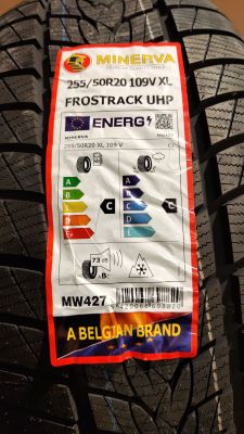 a close up of a tire with a sticker on it
