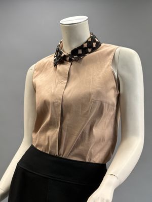 beige silk sleeveless blouse with black and white checkered collar