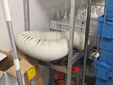 a room with a bunch of boxes and a mop on the floor