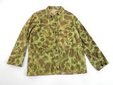 a camouflage jacket on a white background with a white background