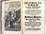 un livre ouvert sur lequel figure l'image d'un homme à cheval et d'une femme à cheval