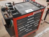 a workbench with tools on it in a garage