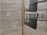 an open book with a picture of a building in the background