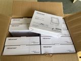 many boxes of electronic devices in a cardboard box