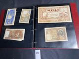several different types of paper money are on display in a binder