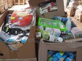 many boxes of assorted items in a large warehouse