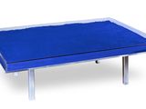 an image of a blue table with a glass top on a white background