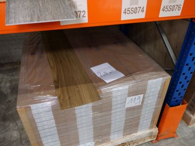 a box of wood on a pallet in a store