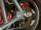 a close up view of the front wheel of a motorcycle