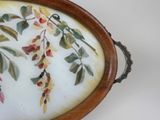 a picture of a tray with a painting on it