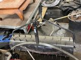 an image of a bike being worked on in a garage