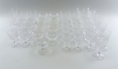 a lot of empty wine glasses sitting on a table