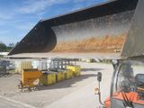 a large bulldozer that is sitting in the dirt