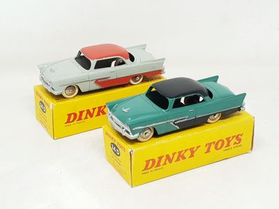 three toy cars that are sitting on top of a box