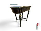 a small table with a marble top on a white background