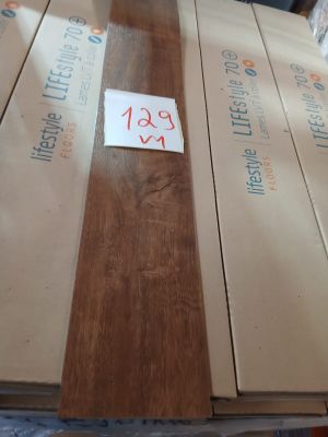 several boxes of wood are stacked on top of each other on a table