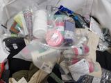 a bag full of items that are sitting on the floor