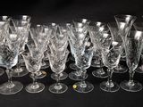 a lot of empty wine glasses sitting on a table