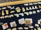 a picture of a display of animal figurines in a shadow box