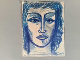 dessin représentant le visage d'une femme sur une feuille de papier