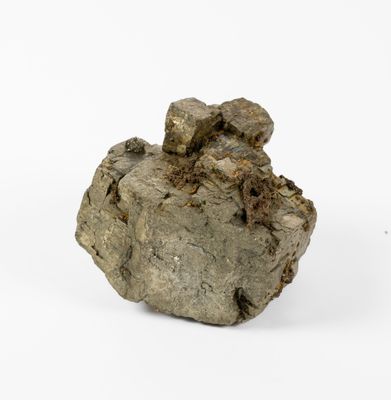 a rock that is sitting on a white surface