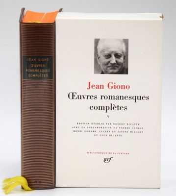 the book is sitting on the table next to the book